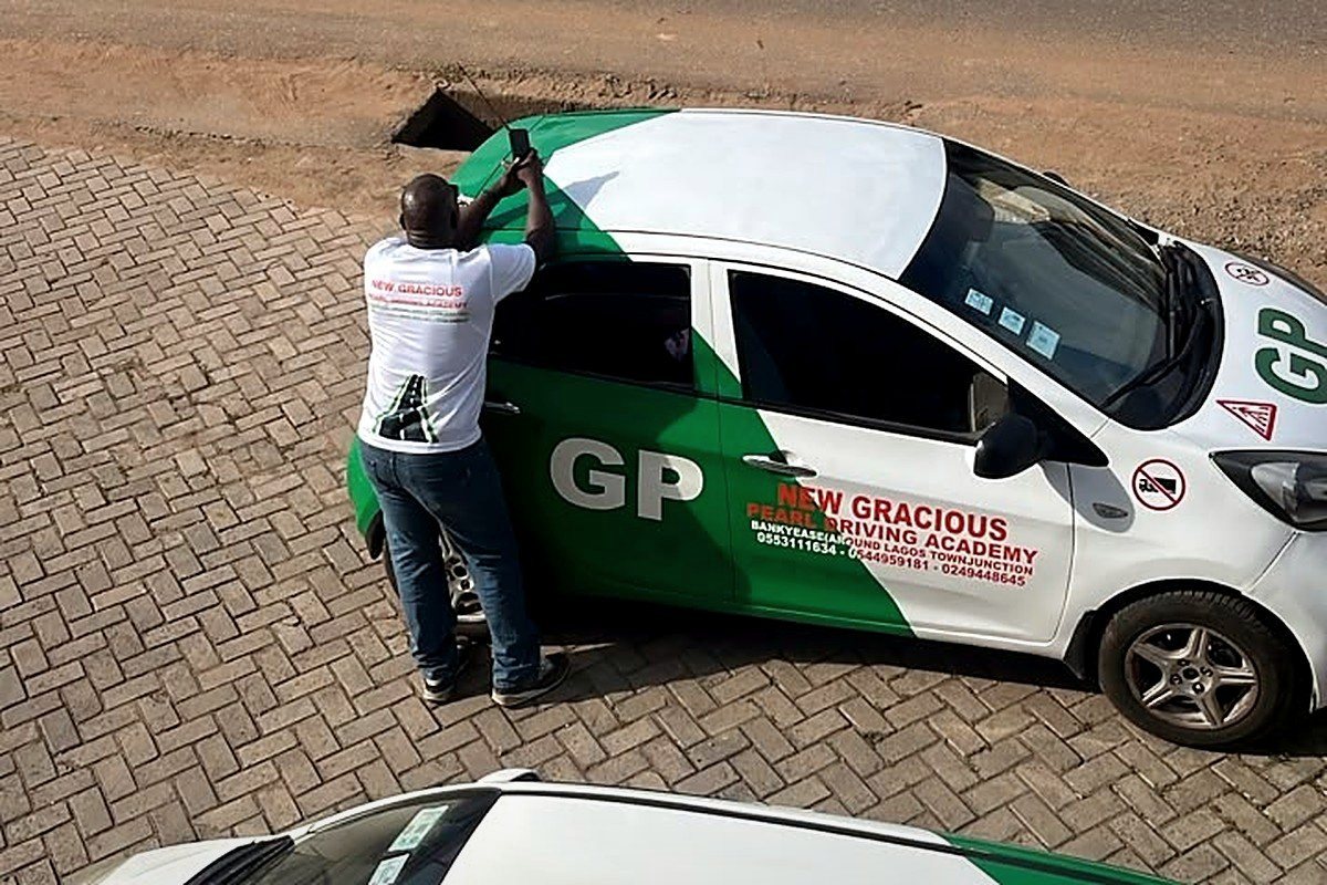 Instructor checking a training car