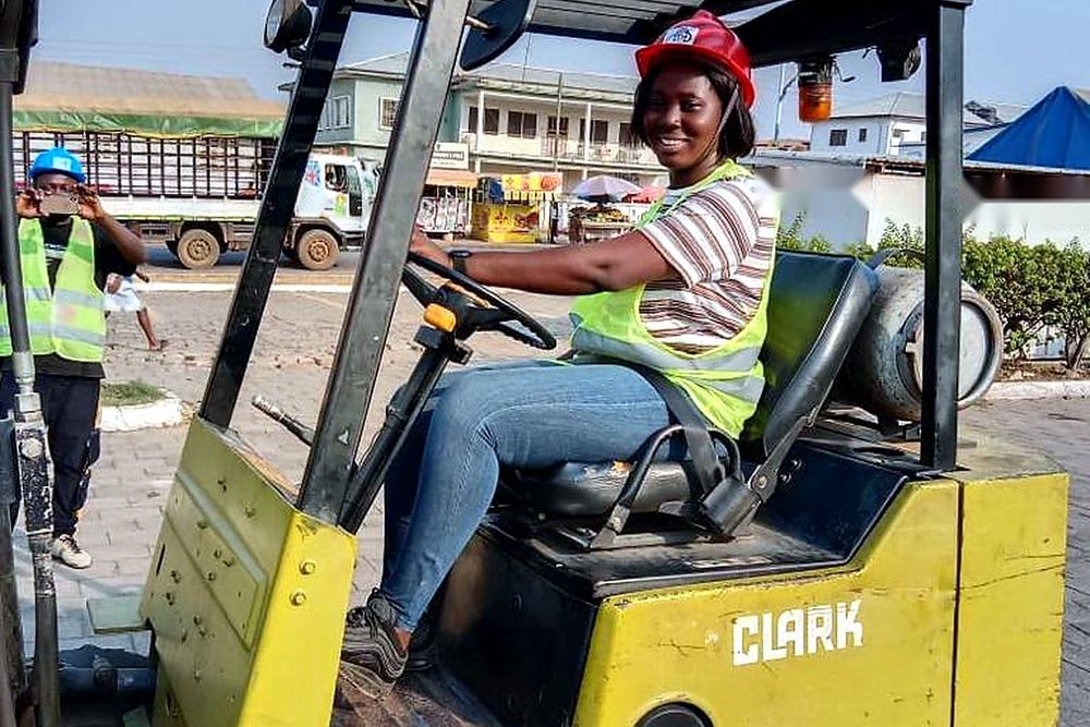 Student operating a forklift during training